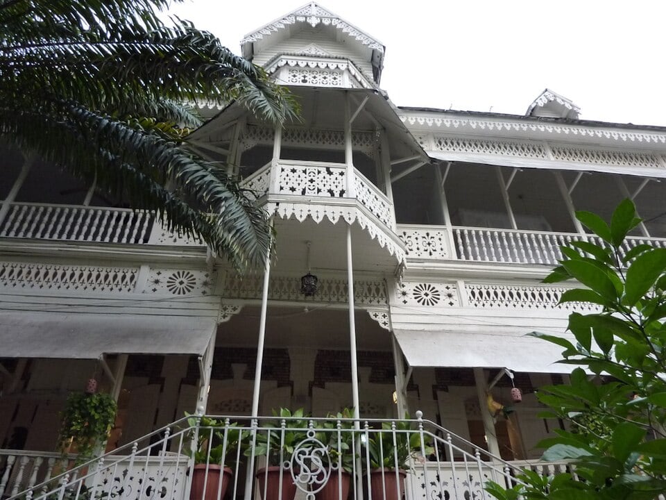 Exterior of Hotel Oloffson in Port-au-Prince, Haiti - gingerbread houses of Port-au-Prince