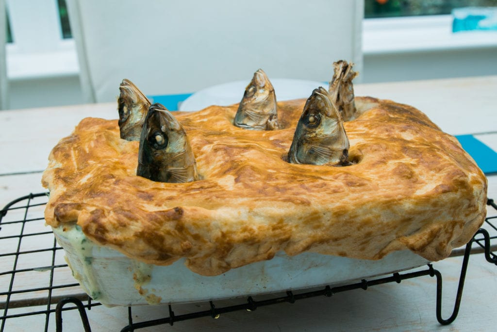 Stargazy Pie Mousehole Cornwall England UK by Davis Dorss Shutterstock