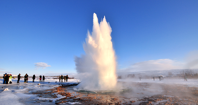 Water erupting from Strokkur geyser in Iceland 