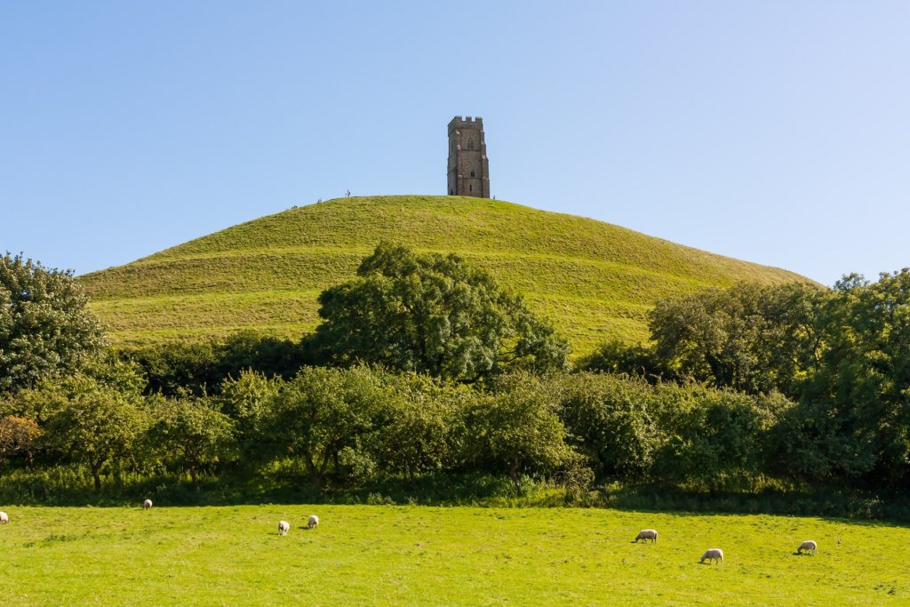 This image has an empty alt attribute; its file name is shutterstock_270218954_Glastonbury_Tor_ian_woolcock-1024x683.jpg