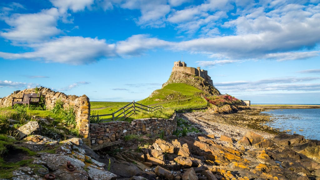Lindisfarne Castle Northumberland by Michael Conrad Shutterstock alternative British summer guide