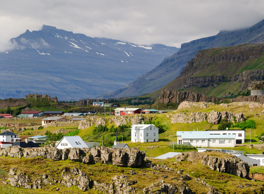 Houses on hills in the East Fjords in Iceland