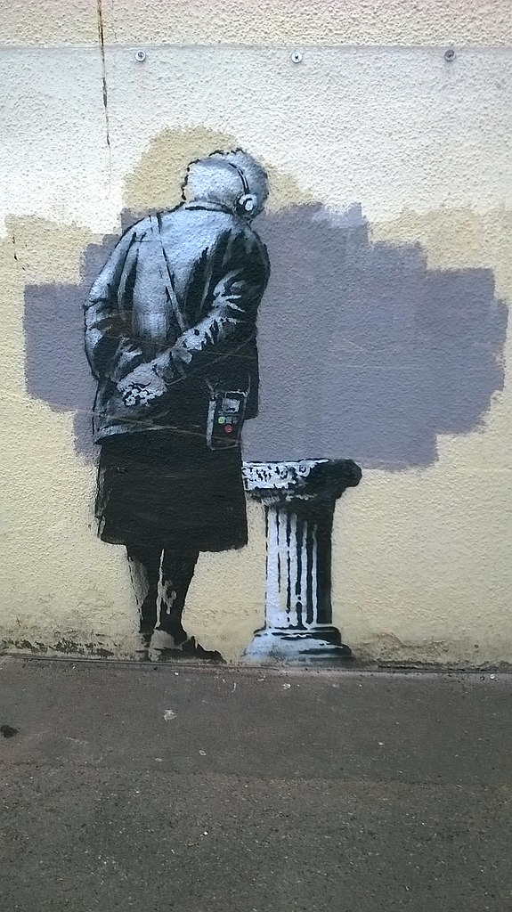 This image has an empty alt attribute; its file name is Banksy_Folkestone_Kent_England_Robert-Zozmann_Wikimedia_Commons.jpg