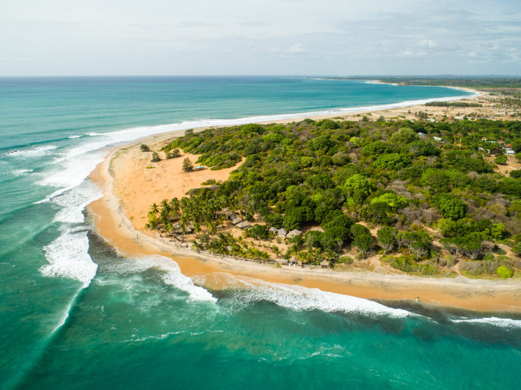 Waves crash on the shore of Arugam Bay in Sri Lanka 