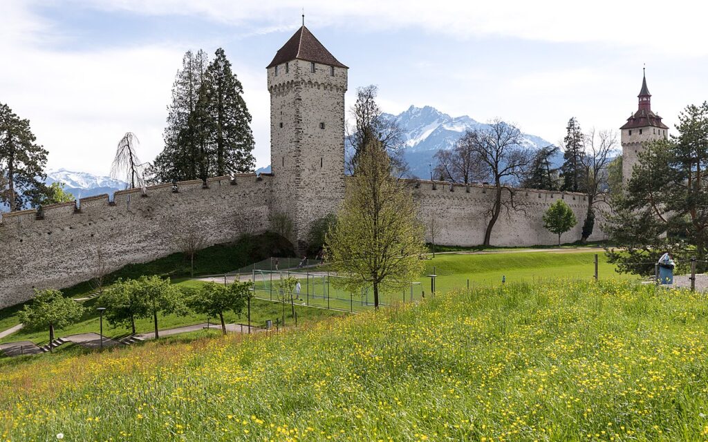 This image has an empty alt attribute; its file name is Town_Walls_Luzern_Switzerland_JoachimKohlerBremen_Wikimedia_Commons-1024x640.jpg