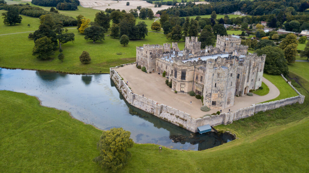 Raby Castle is surrounded by greenery. 