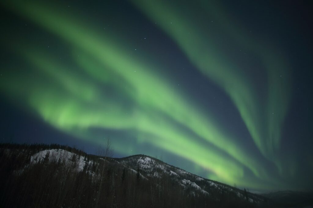 The northern lights shine over the Chena Hot Springs in Alaska 