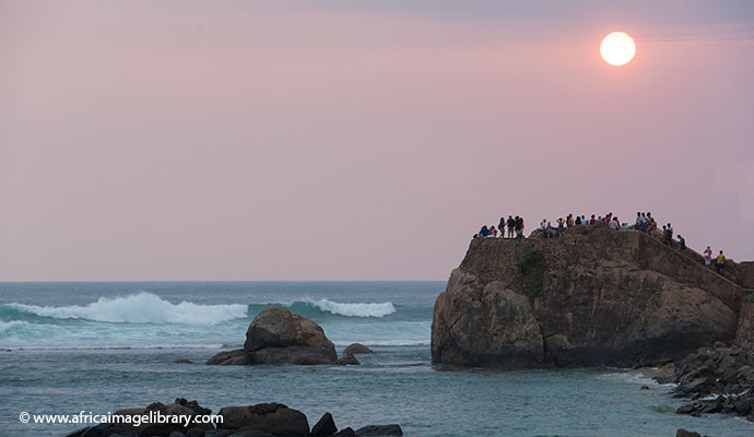 The sun sets over Flag Rock Bastion at Galle Fort in Sri Lanka 