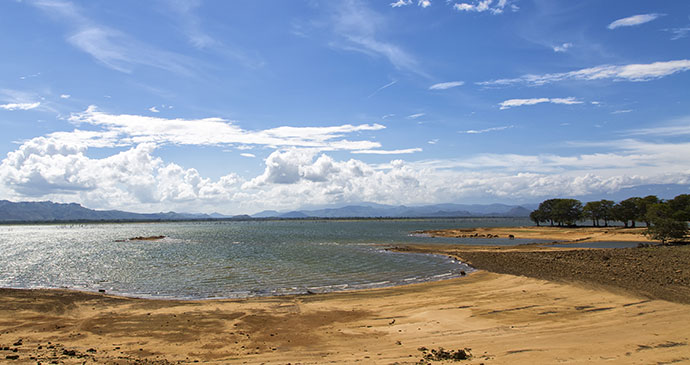 The sun shines on Udawalawe reservoir in Sri Lanka 