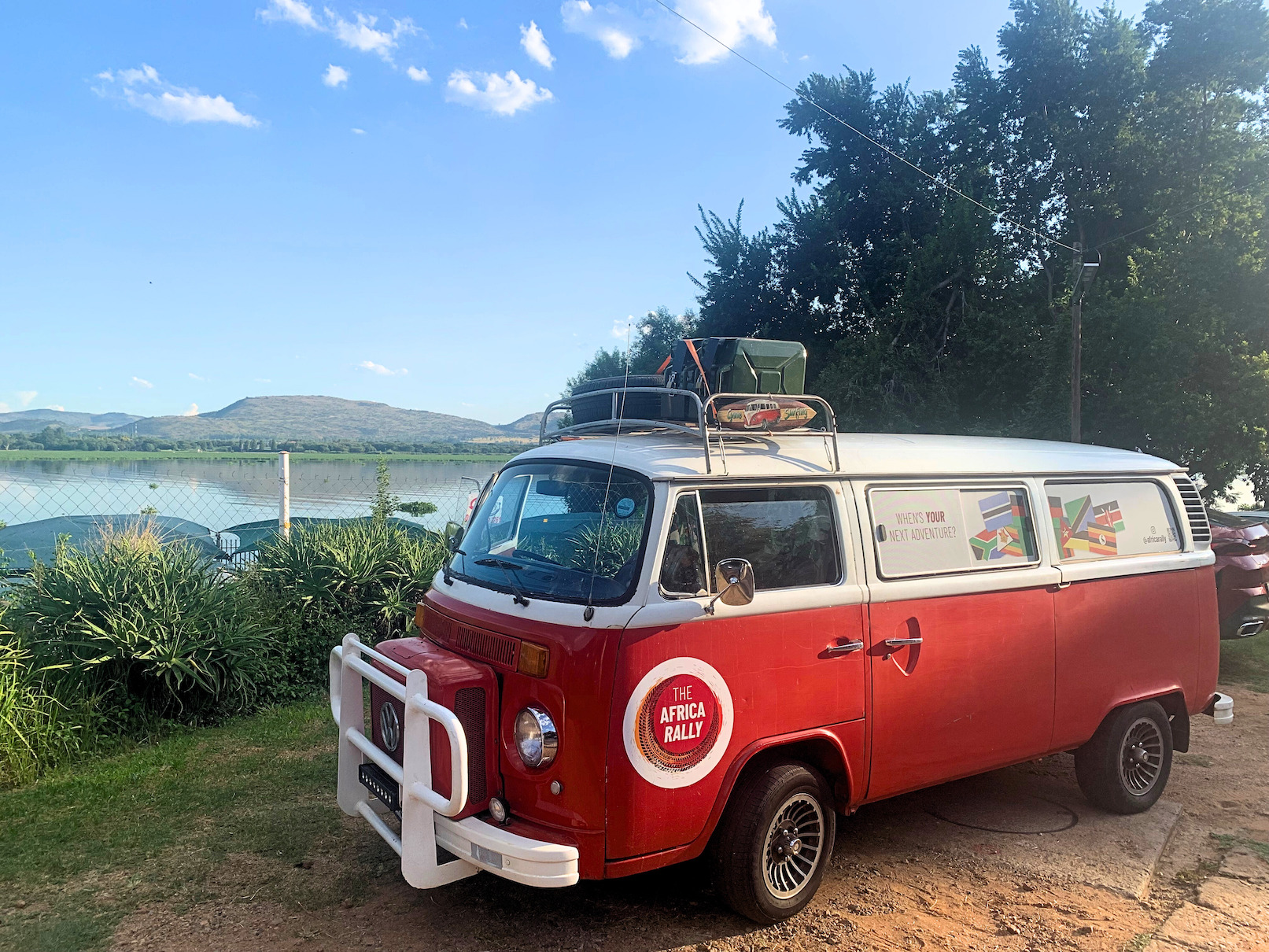 VW in front of a lake during the Africa Rally