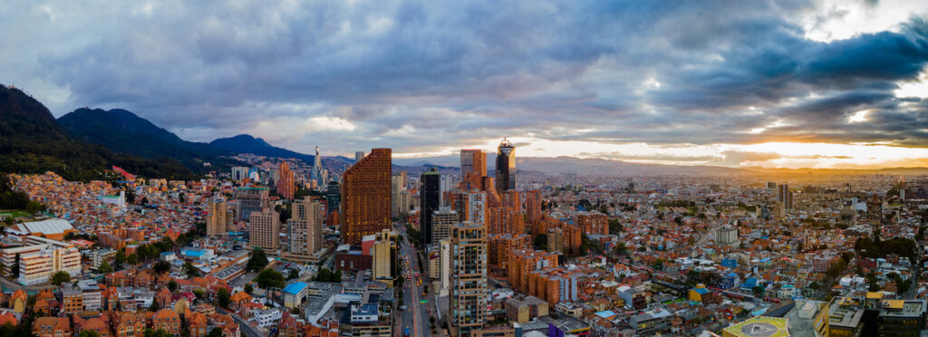 This image has an empty alt attribute; its file name is skyline_bogota_colombia_henry_l_ramirez_shutterstock-1024x372.jpeg