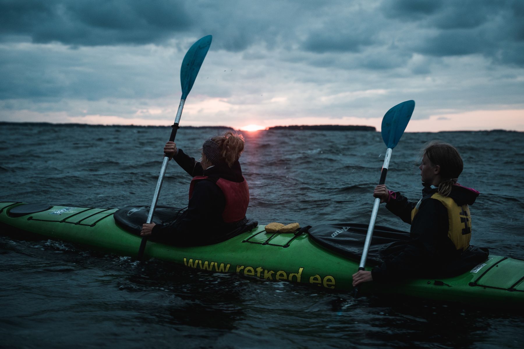 Two kayakers in the waters of Pesassaar, an island off the coast of Estonia
