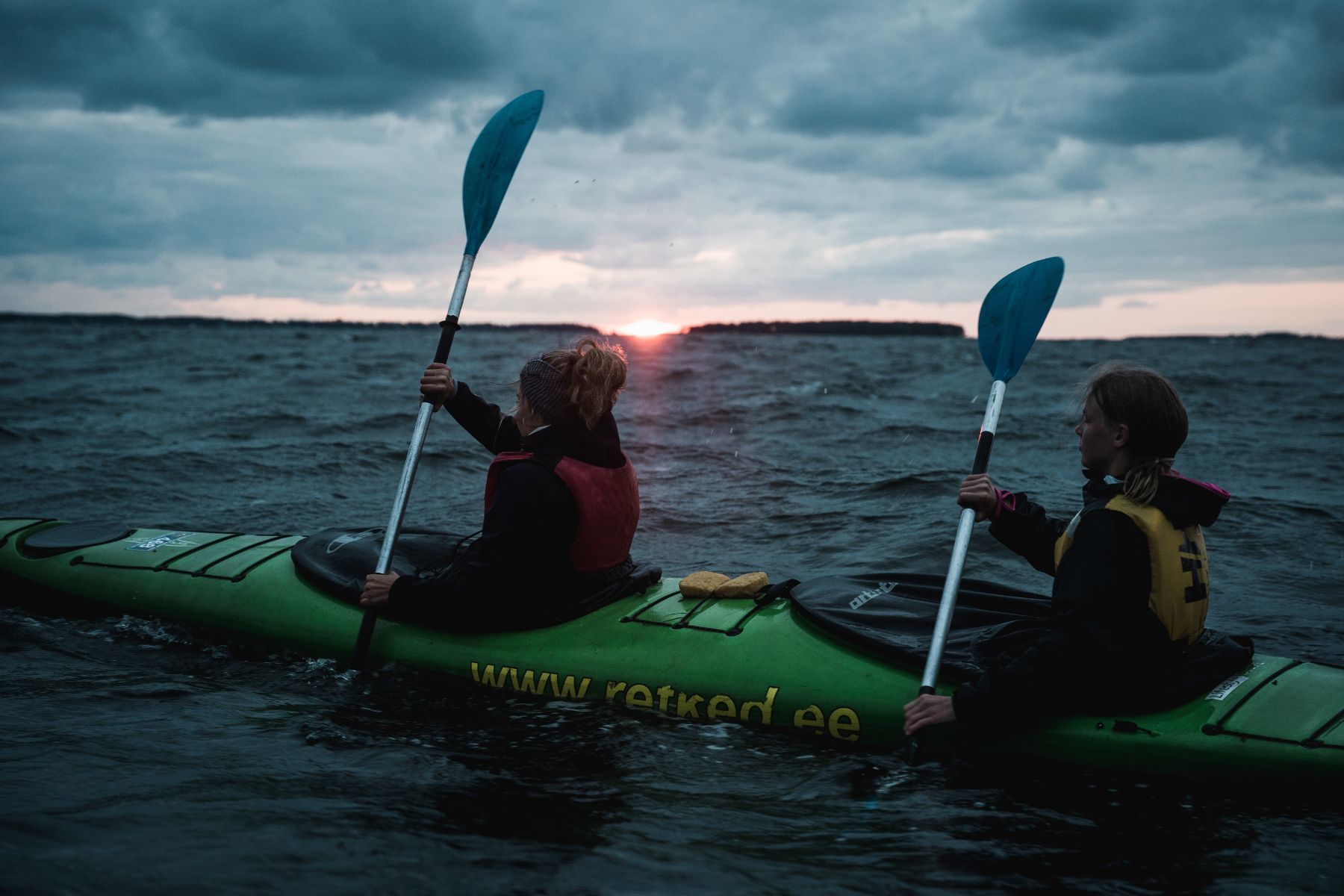 Two kayakers in the waters of Pesassaar, an island off the coast of Estonia