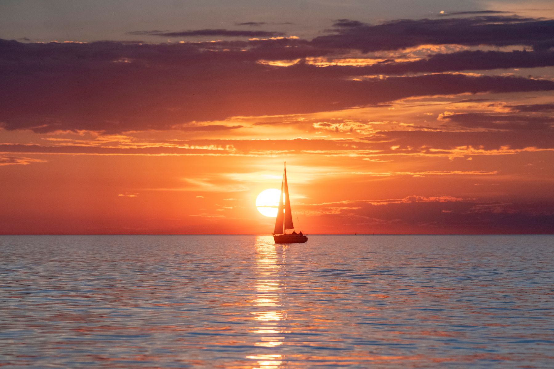 A boat silhouetted against the sunset, Tallinn Bay, Estonia