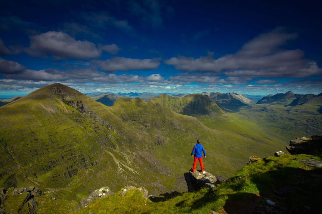 A hiker overlooking the Torridon Mountains, Scotland