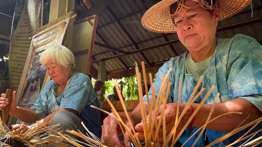 Women making traditional hats by hand in Phrae Thailand
