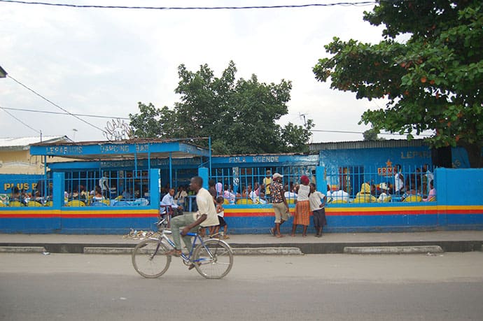 Man riding a bicycle in Brazzaville Congo