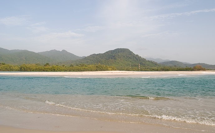 Blue sky over River Number Two, best beaches in Sierra Leone 