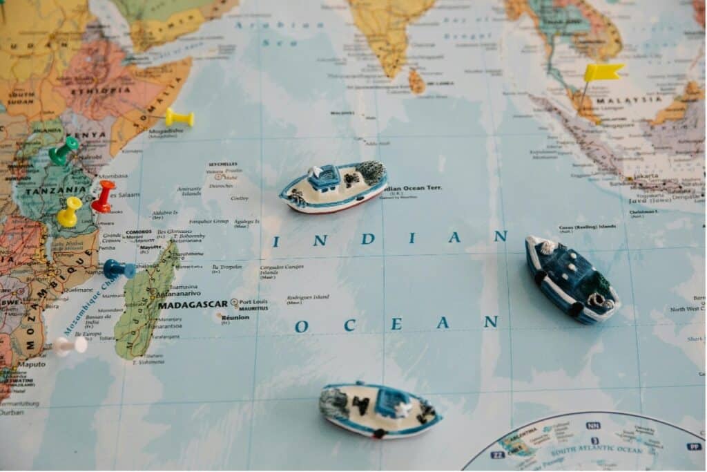 plastic boats on a map of the Indian Ocean - interesting facts about Madagascar