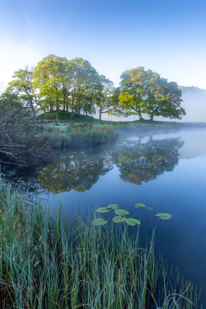 Fog over the water in Elter Water in the Lake District
