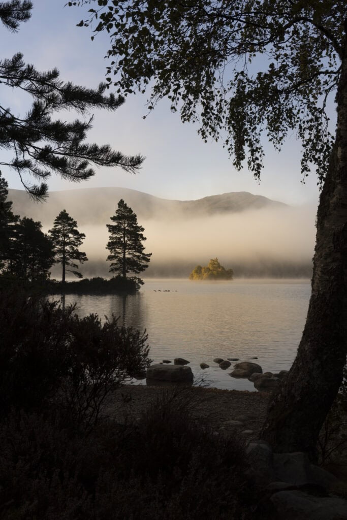 Misty sunset at Lock An Eilein in Scotland - where to take photos in Britain