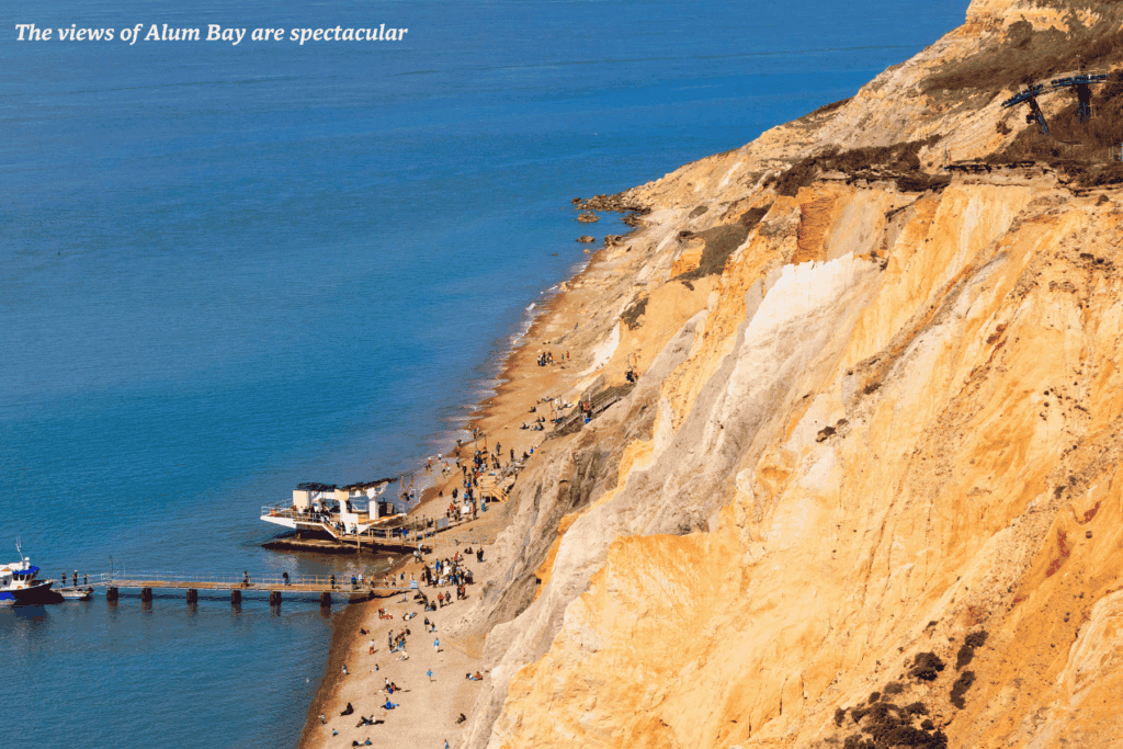 People on the beach at Alum Bay on the Isle of Wight, England