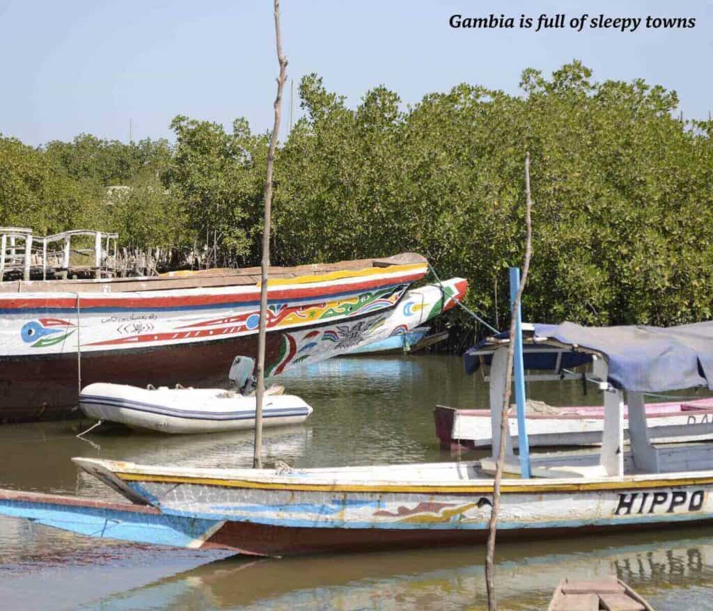 Boats docked on a river in The Gambia