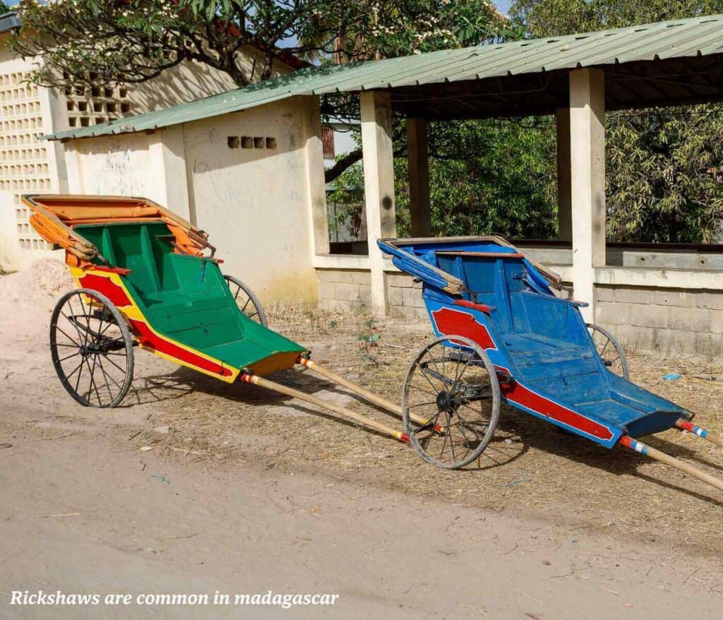 Colourful rickshaws parked in a city in Madagascar