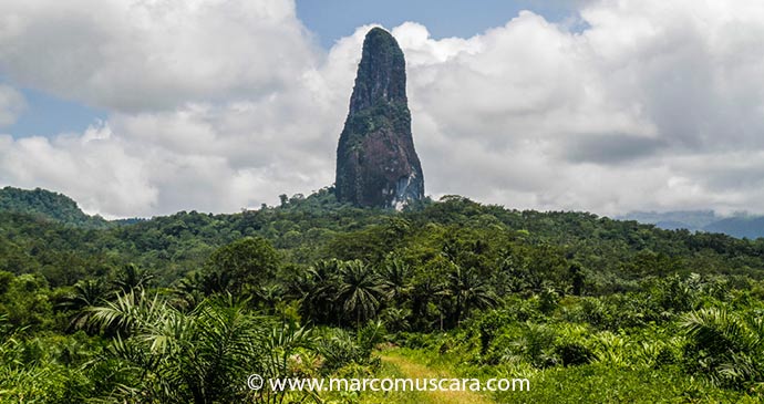 View of the Pico Cão Grande monolith in São Tomé and Príncipe, Africa by Marco Muscarà