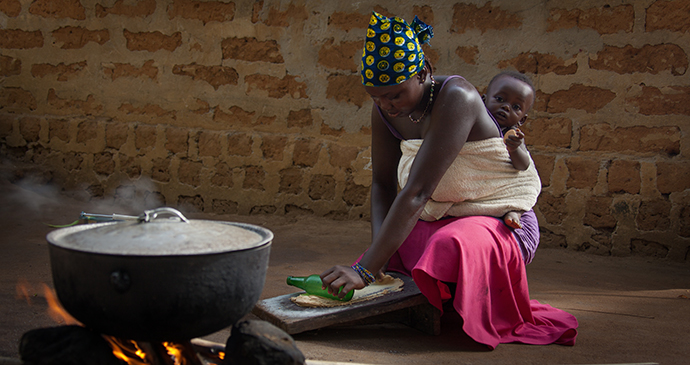 woman cooking Sierra Leone by robertonencini Shutterstock