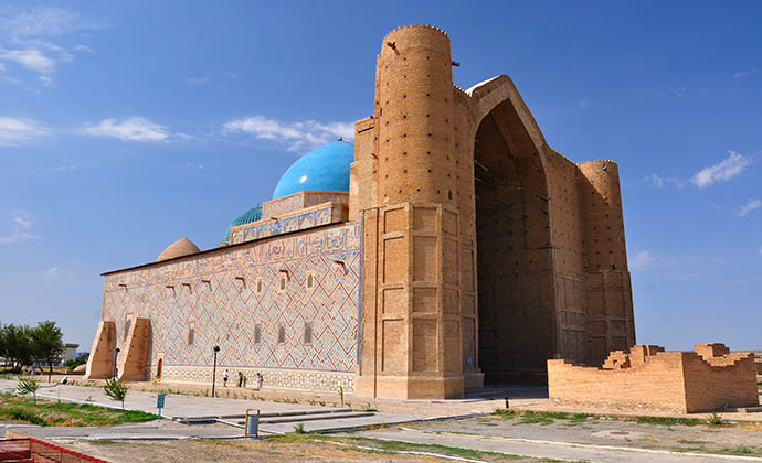 Mausoleum of Khoja Ahmed Yassaui Turkestan Kazakhstan by Djusha, Shutterstock