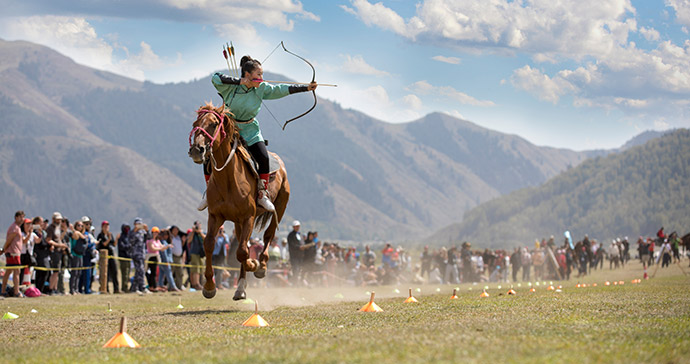 horseback archery, World Nomad Games, Kyrgyzstan by Katiekk, Shutterstock