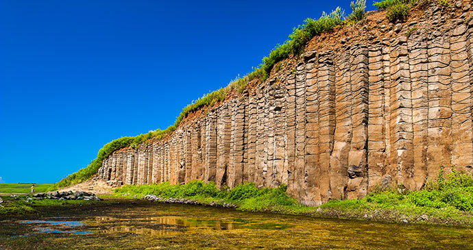 basalt columns penghu taiwan by htu shutterstock