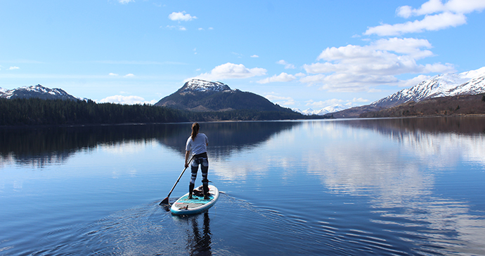 Lizzie Carr on a Stand Up Paddle Board on Loch Laggan, Scotland © Lizzie Carr