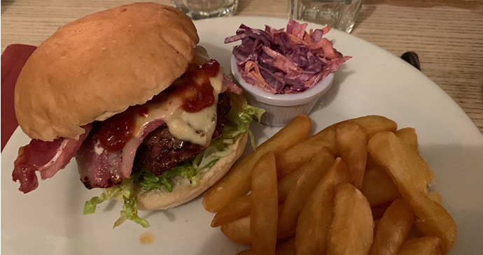 Beef burger, emmental and bacon topping, chips, The Maltsters Arms © Holly Parsons