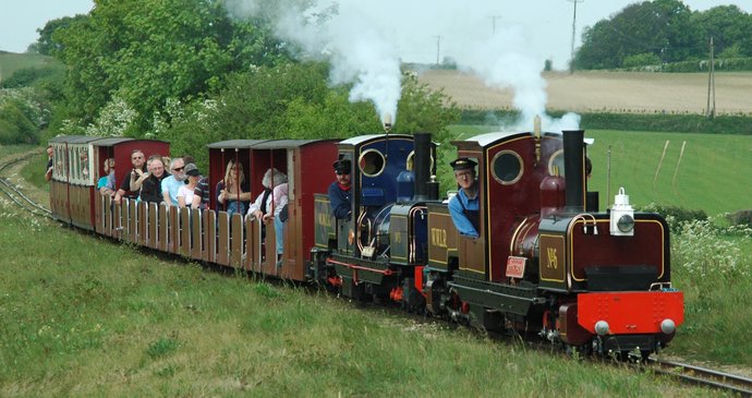 Families ride the train t Wells & Walsingham Light Railway in Norfolk 