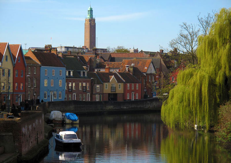 The clock tower of Norwich City Hall seen from the River Wensum Norfolk UK by Laurence Mitchell walking route