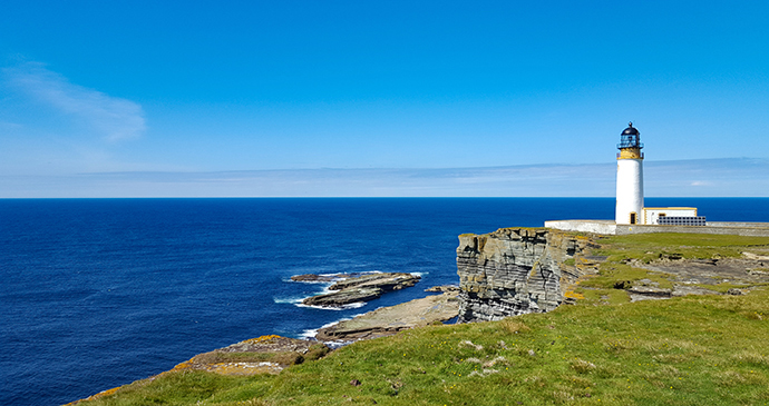 Noup Head lighthouse Orkney by Chris Noe, Shutterstock cliff walks