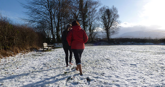 Jini and Lynne walking barefoot by Jini Reddy