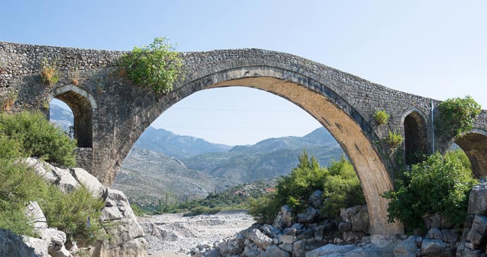 Mesi Bridge near Shkodra Albania by ollirg, Shutterstock