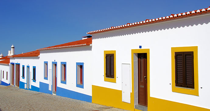 Painted Houses Alentejo Portugal Europe by Inacio Pires, Shutterstock