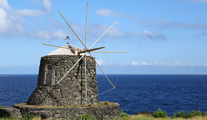 Windmill Corvo Azores by Boarding1now Dreamstime