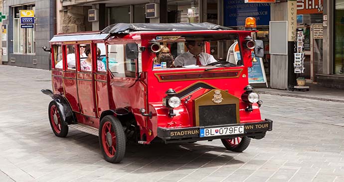 Tourist Bus Old Town Bratislava Slovakia by DeymosHR Shutterstock