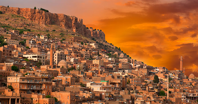 evening view of old town of mardin in eastern turkey by muratart shutterstock