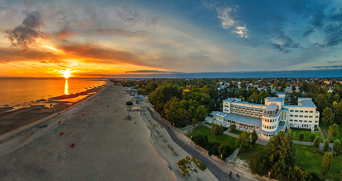 sunset Parnu beach Estonia by Kristian Pikner Wikimedia alternative beach destinations europe