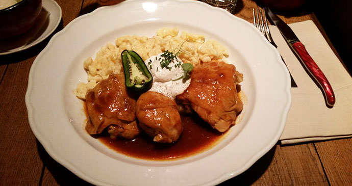 Chicken paprikash with dumplings Baltazar Budapest Hungary by Laura Pidgley