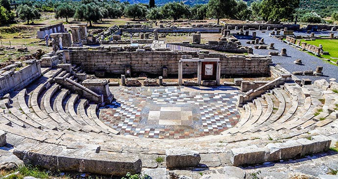 Ruins theatre Ancient Messene Peloponnese Greece Europe by elgreko Shutterstock