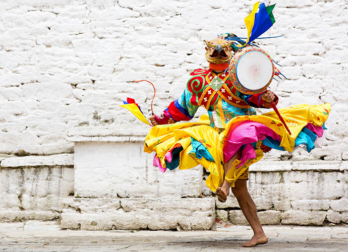 Eagle masked dancer Bhutan by letusgophoto